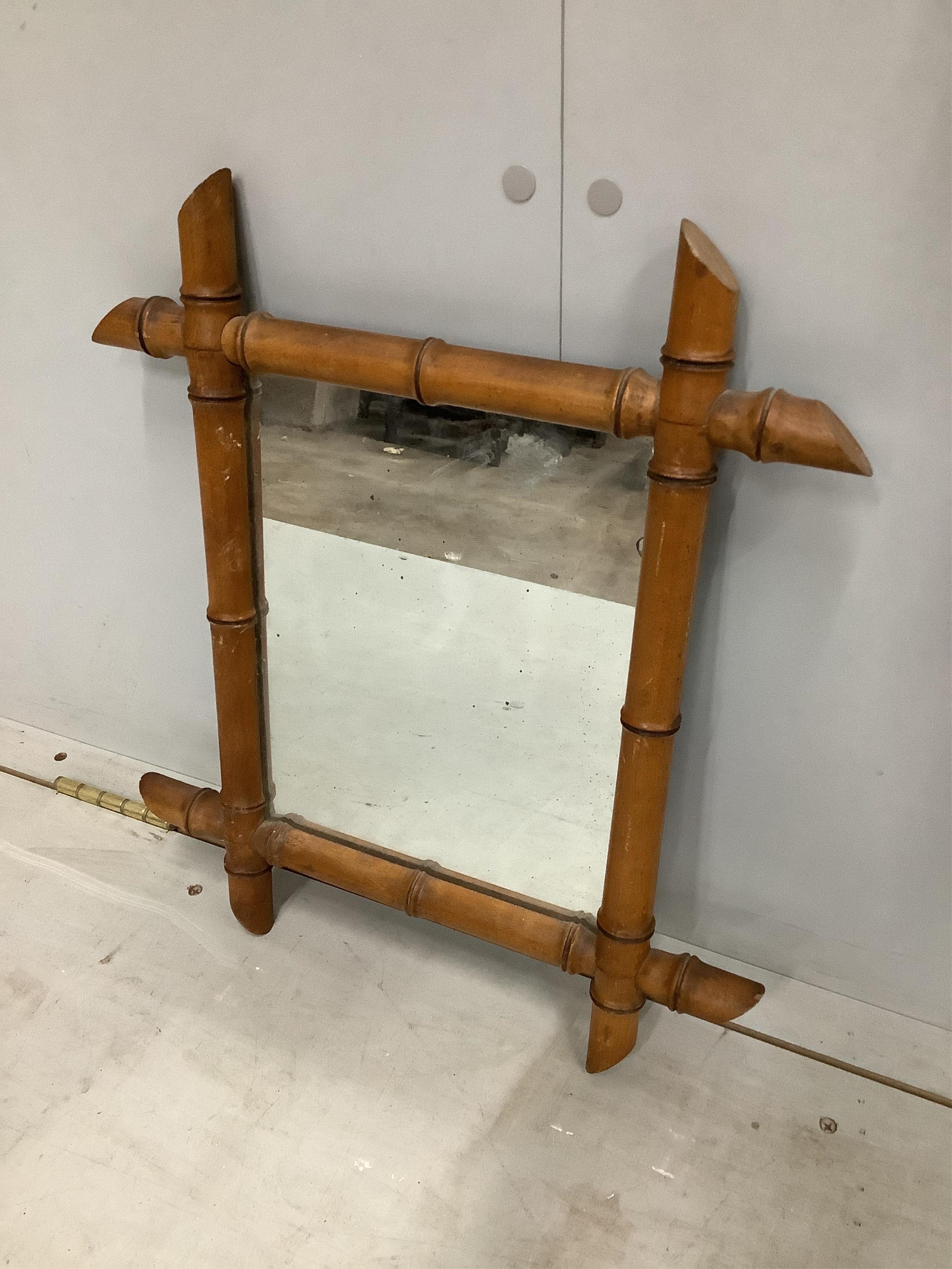 Two late 19th century French rectangular simulated bamboo wall mirrors, larger width 45cm, height 63cm. Condition - fair